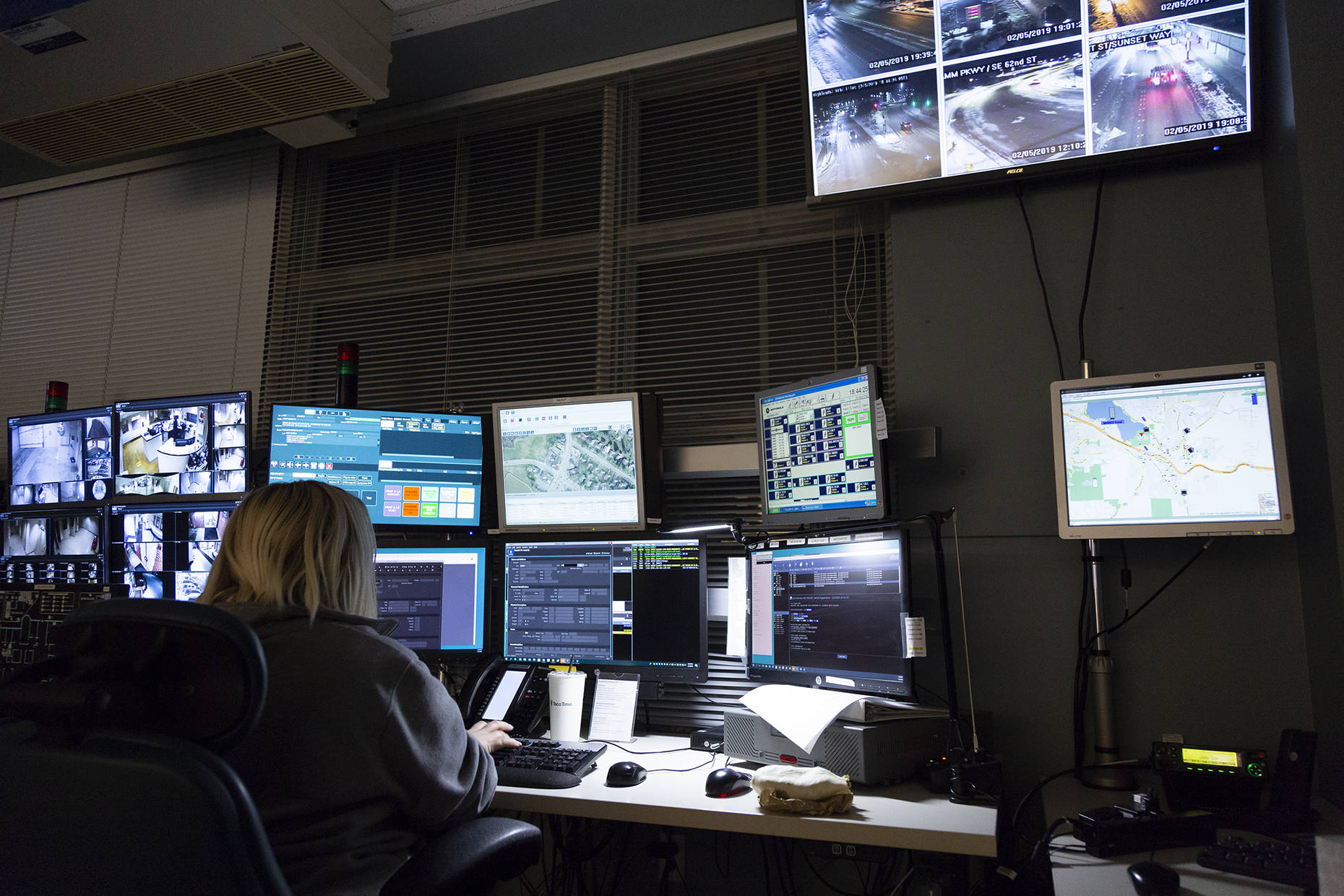 Moore monitors surveillance screens during her work day. Ashley Hiruko/staff photo
