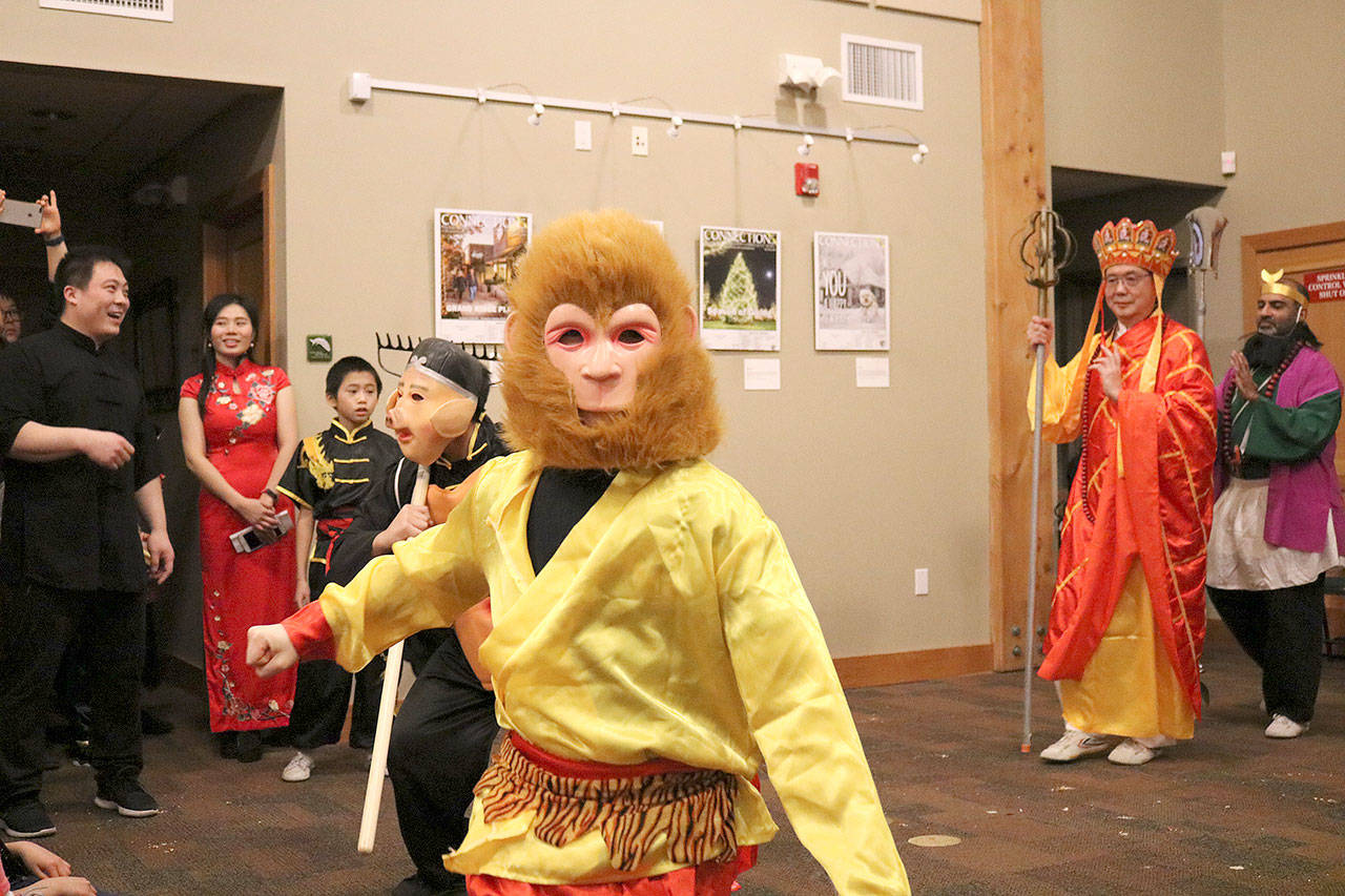 Seattle Seattle Shaolin Kungfu Academy preformed a dance that told the story of the western journey. The story included a pig god and the monkey king. Stephanie Quiroz/staff photo