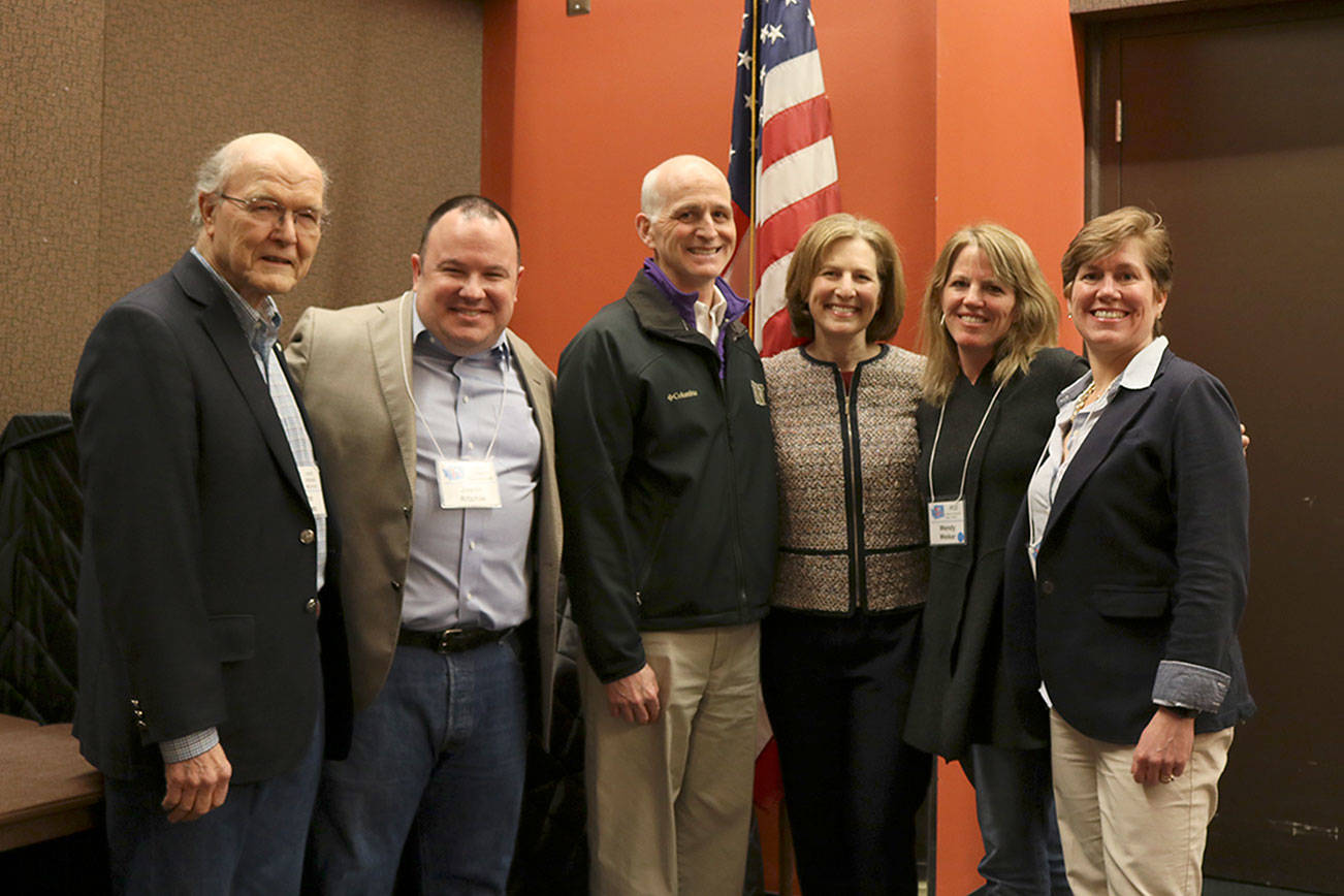 Adam Smith and Kim Schrier visit the 41st Legislative District Democrats