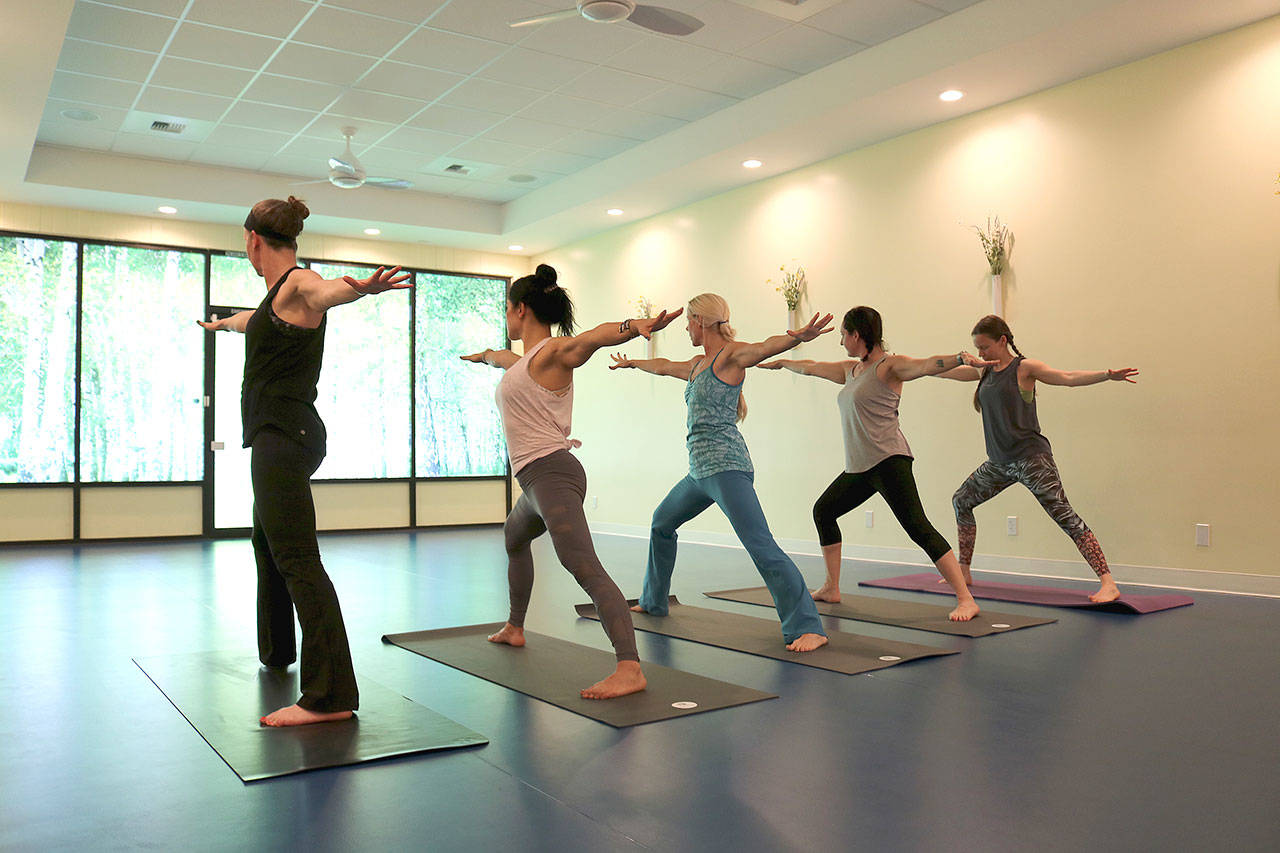 Spira Power Yoga held a free class before the ribbon cutting ceremony on April 9. Stephanie Quiroz/staff photo