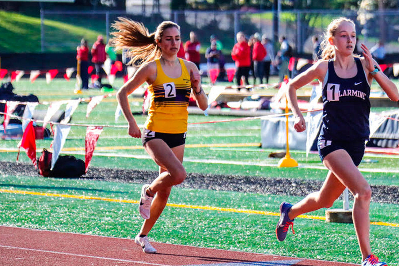 Issaquah Eagles sophomore Julia David-Smith (pictured on left) captured second place in the 800 meters at the Nike Eason Invitational on April 20 in Snohomish. David-Smith clocked a time of 2:13.01. Photo courtesy of Don Borin/Stop Action Photography