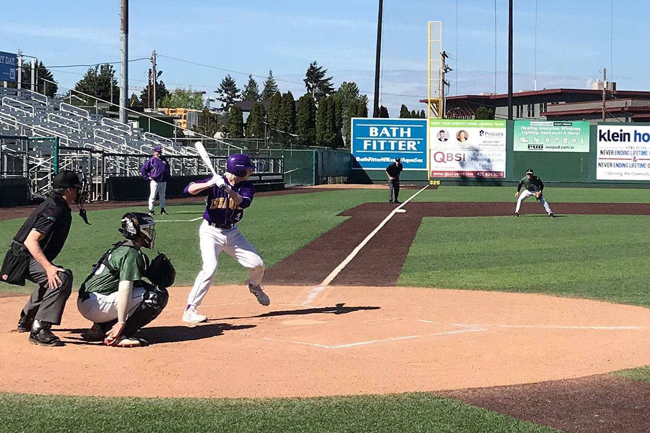 Issaquah Eagles leadoff hitter Tyler Reese (pictured at the plate) prepares for a pitch unveiled by Jackson freshman pitcher Dominic Hellman in the top of the first inning. Issaquah defeated Jackson, 5-2, in a loser-out, 4A Wes-King playoff game on May 8 at Everett Memorial Stadium. Shaun Scott/staff photo