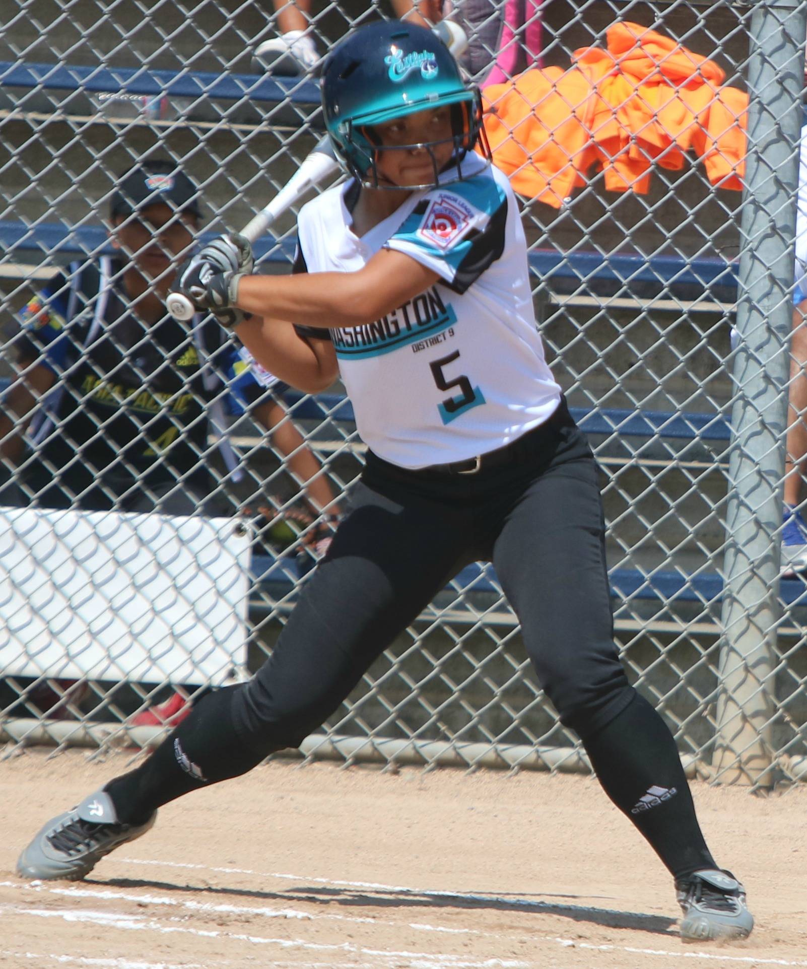 Malia Moriarity sets up at the plate before hammering a triple against Central. Andy Nystrom/ staff photo