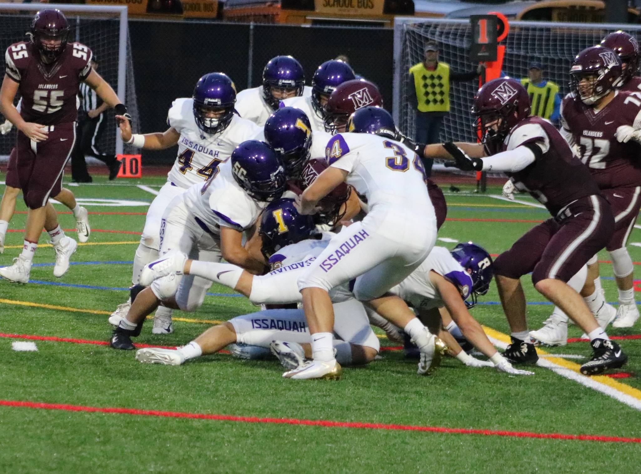 The Eagles defense swarming to the ball during the first quarter of their 12-3 victory over Mercer Island on Sept. 13. Benjamin Olson/ staff photo
