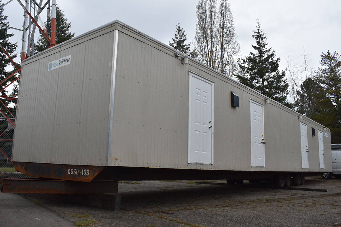 Photo by Haley Ausbun. A preview of the first modular unit being used to house King County residents under quarantine for COVID-19, coronavirus. The units will be located on a county-onward parcel in White Center, where an old office building is planned to be demolished to make space.