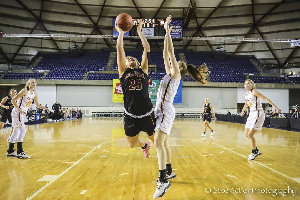 Issaquah sophomore Mercedes Tinder puts up a shot during their 68-57 victory over Moses Lake in the 4A state tournament on March 6 at the Tacoma Dome. Photo courtesy of Don Borin/Stop Action Photography