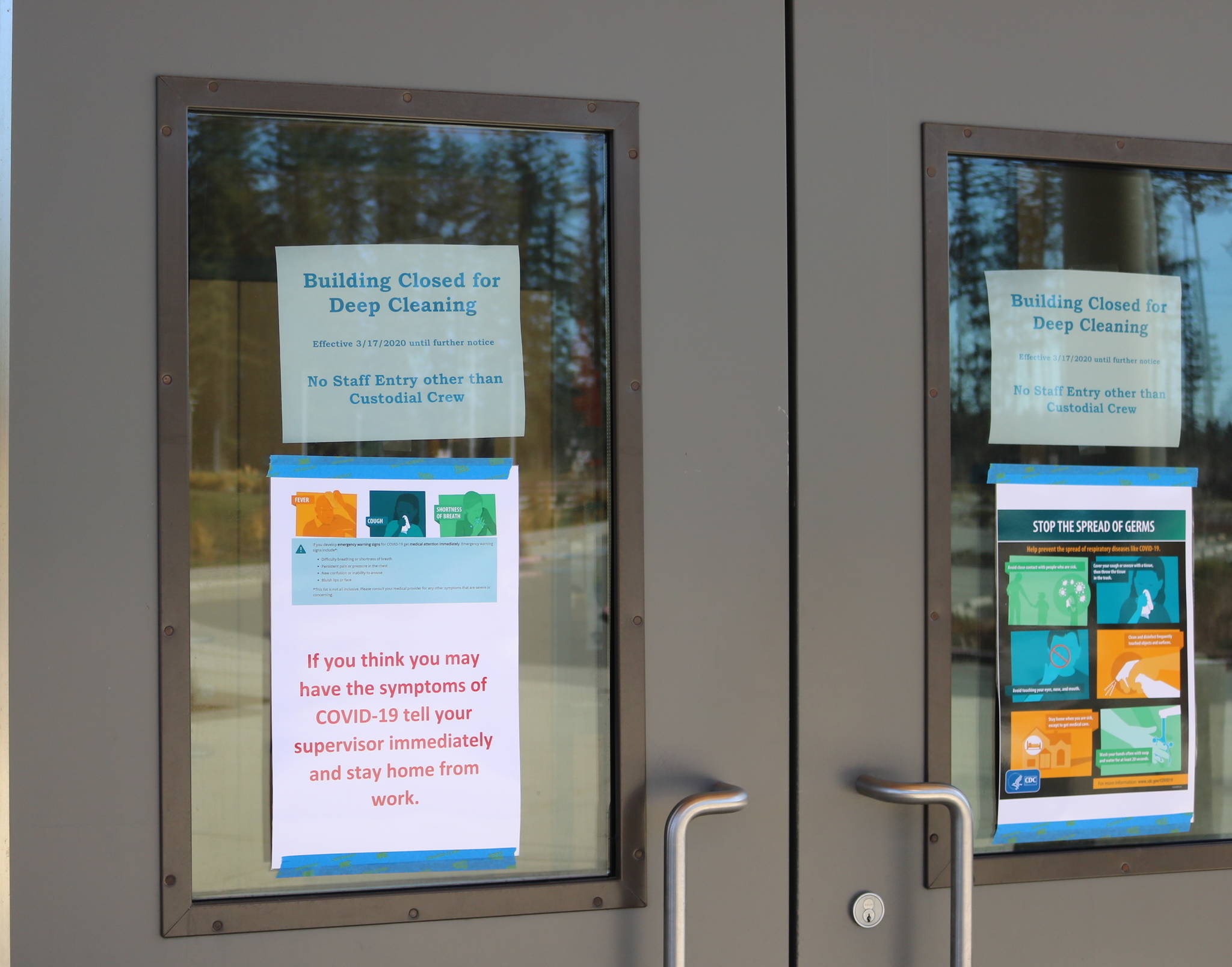 A sign on the door at Sunny Hills Elementary informs visitors that the school is closed for deep cleaning. Benjamin Olson/staff photo