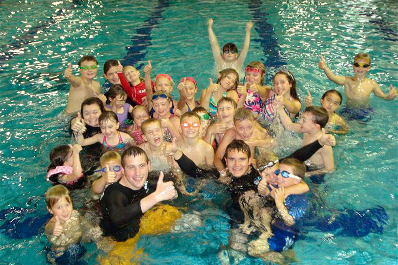 The third phase of Washington’s reopening will allow recreational sports with five to 50 people, gatherings of fewer than 50 people, all non-essential travel and open facilities like public pools, libraries and museums. This 2019 file photo shows teenagers at the Enumclaw pool. Courtesy photo