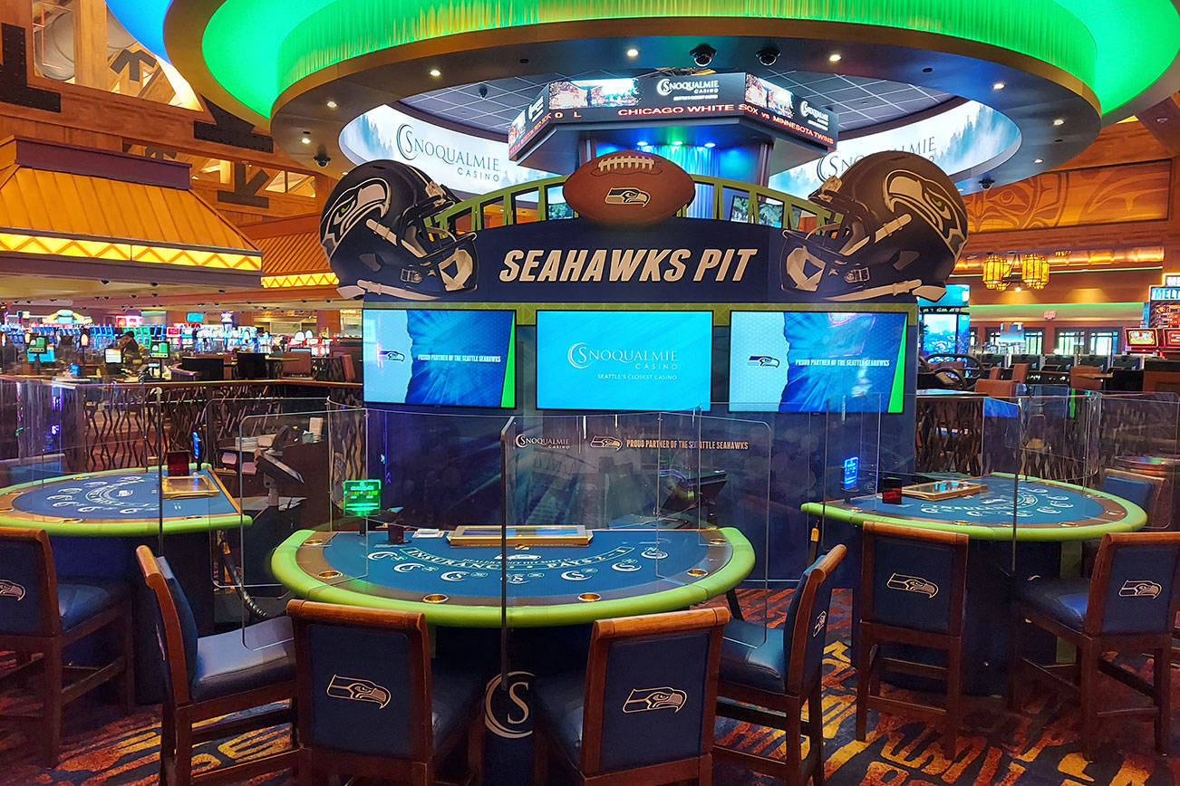 Snoqualmie Casino unveiled the first immersive Seahawks-branded table game experience Sept. 18, 2020, in a ribbon cutting dedication with Snoqualmie Tribe Council members and Snoqualmie Casino executives. Courtesy photo