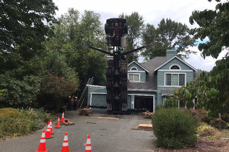 Crane collapsed on Issaquah home (courtesy of Eastside Fire and Rescue Twitter page)