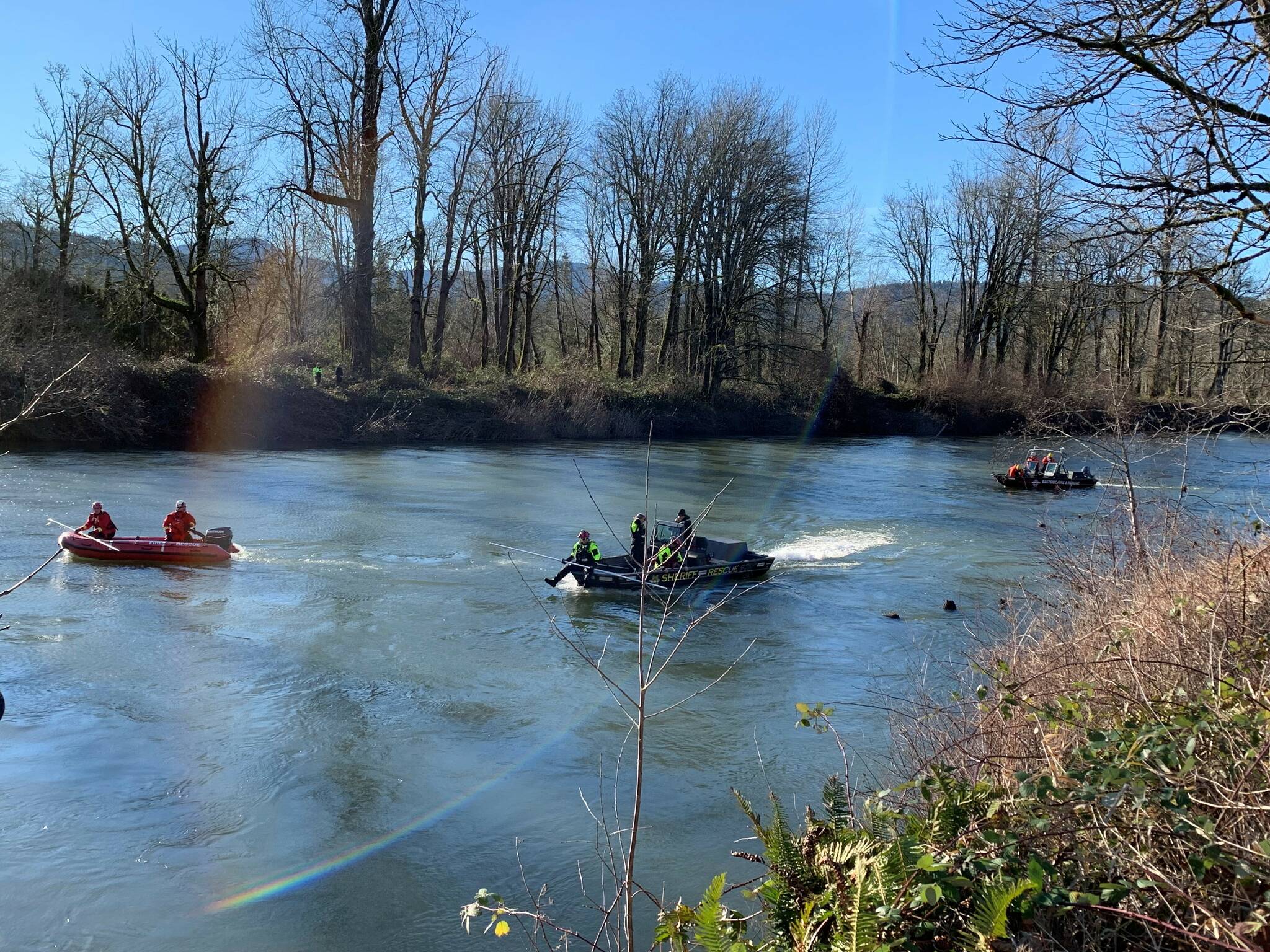 Search and Rescue Crews look for car crash victims along Snoqualmie River near Fall City. Courtesy of Washington State Patrol.