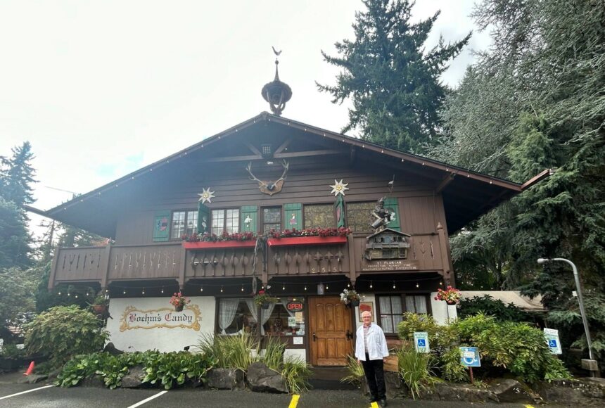 <p>Bernard Garbusjuk stands outside of Boehm’s Candies, 255 NE Gilman Boulevard in Issaquah. (Photo by Cameron Sires/Sound Publishing)</p>