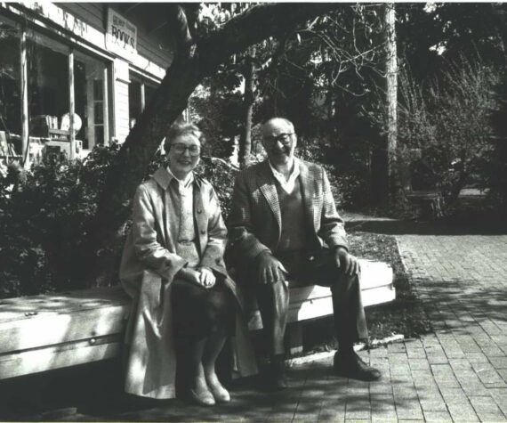 Ruth and Marvin Mohl sit on a bench in Gilman Village. The Village, which once held 27 shops, now holds over 40. (Photo courtesy of the Gilman Village)