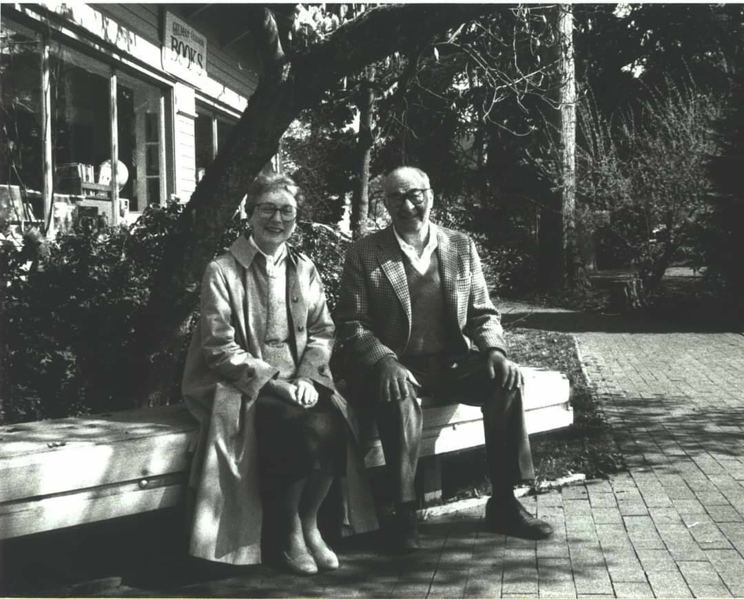 Ruth and Marvin Mohl sit on a bench in Gilman Village. The Village, which once held 27 shops, now holds over 40. (Photo courtesy of the Gilman Village)