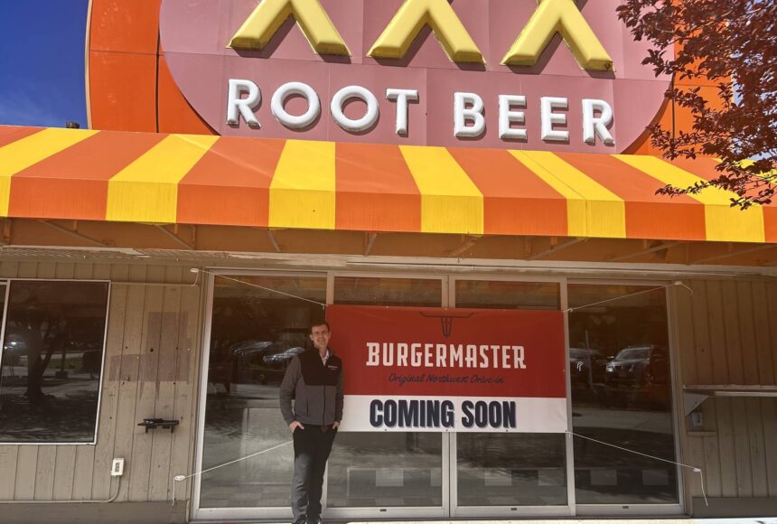 <p>Alex Jensen, CEO and owner of Burgermaster, stands next to the prospective sixth Burgermaster location. (Photo by Cameron Sires/Sound Publishing)</p>