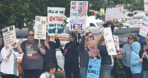 People rally June 14 in Covington during the first No Kings protest against the Trump administration. FILE PHOTO