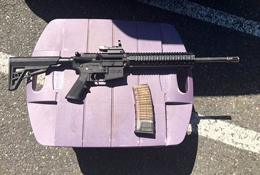 <p>An AR-15 rifle and a loaded magazine that were recovered from a suspect in a shooting incident at the Kent Station parking garage in 2019. (Photo courtesy of King County Sheriff’s Office)</p>