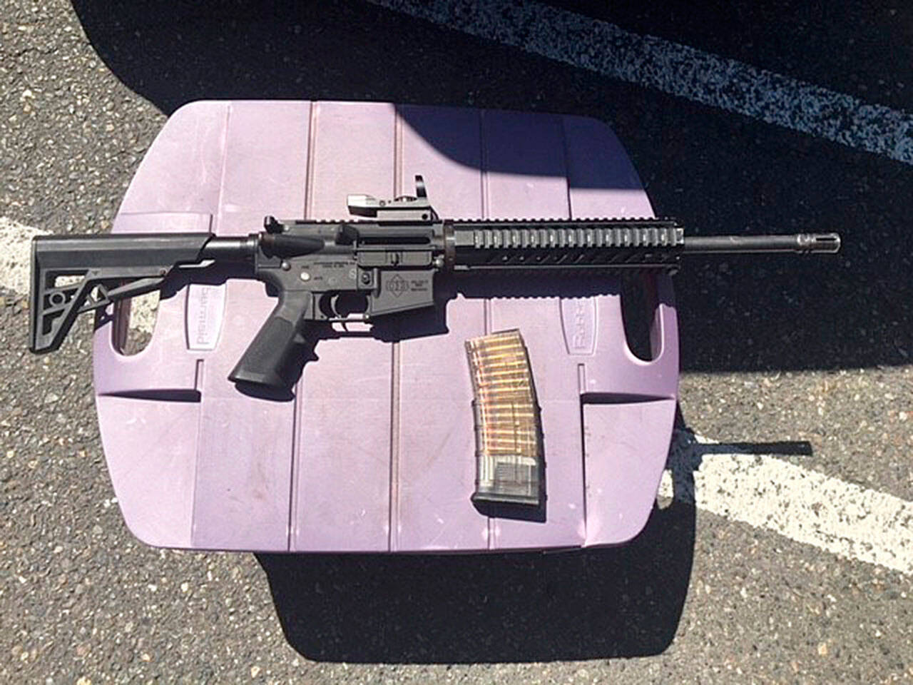 An AR-15 rifle and a loaded magazine that were recovered from a suspect in a shooting incident at the Kent Station parking garage in 2019. (Photo courtesy of King County Sheriff’s Office)