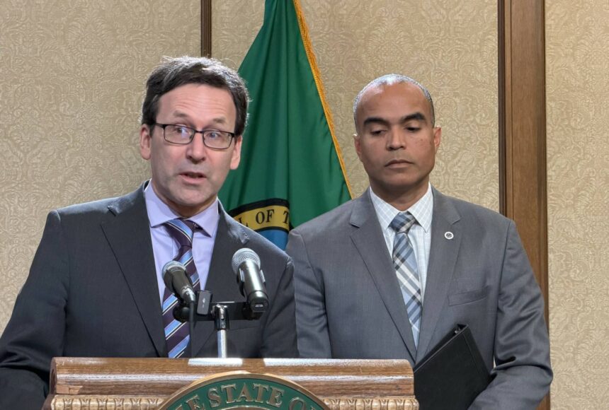 <p>Gov. Bob Ferguson answers a question during a joint press conference with Attorney General Nick Brown Jan. 26. Photo by Cassie Diamond</p>