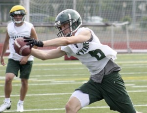 Skyline's Tait Stephens snags a pass during the opening week of practice. The senior who played back-up quarterback last season