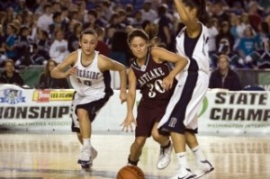 Eastlake guard Jess Kelly is swarmed by Auburn Riverside's Makenna Clark