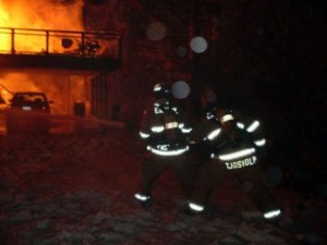 Firefighters attempted to make entry through the front portion of the home before hazardous conditions forced crews to cease operations.
