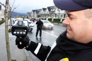 Issaquah Police Officer John Linder displays a LIDAR gun