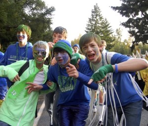 With parents and friends of the school lining the road between Maywood Middle School and Liberty