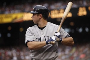 Issaquah graduate and current New York Yankee Colin Curtis bears down Saturday in an at-bat against the Seattle Mariners.
