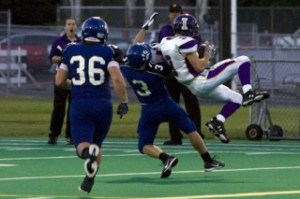 Issaquah's Brennan Miller makes a leaping catch to start the third quarter.