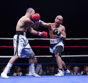 Dex Montenegro (left) throws a punch during his comeback boxing bout at Emerald Queen Casino last weekend.