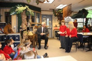 Rep. Dave Reichert (R-Auburn) listens to Blackwell Elementary School second-grade teacher Carol Nicholson and student Owen Wells as the class demonstrates their appreciation on the eve of Veteran's Day.