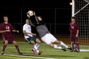 Eastlake goalkeeper Victor Kollar snags a corner kick away from Skyline’s Mitchell Kim Tuesday night while Gordan Savage (13) and Patrick Yagi (14) look on.