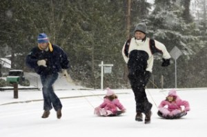 Andrew Jenkins and Chris Jenkins provide the horsepower for 4-year-old Kaylie Jenkins