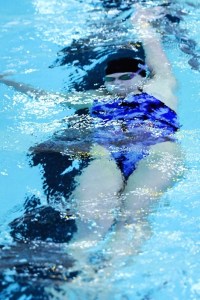 Issaquah's Stacy Maier makes the turn in the 100-yard backstroke final Saturday at the Kingco Conference Championship swim meet at Mary Wayte Pool on Mercer Island.