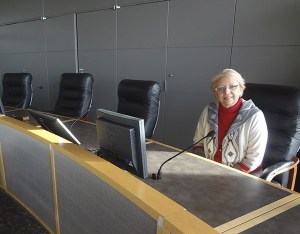 Kathy Huckabay sits in the city chambers.