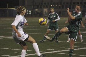 Issaquah’s Kristin Maris battles for a loose ball with Skyline’s Maddie Christ Tuesday night at Issaquah High School.