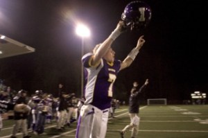 Issaquah's Joey Bradley rushes the field as the final second ticked off the clock Saturday