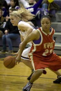 Issaquah's Dayna Talley sneaks by Randi Boseman of Newport during Issaquah's 69-57 win on Wednesday.
