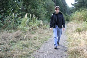 Jeff Tanka walks along the Lake Tradition Plateau trail