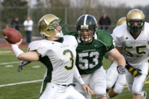 Skyline lineman Rob Tramonte pursues Auburn running back Austin Embody. The Trojans attempted a reverse pass