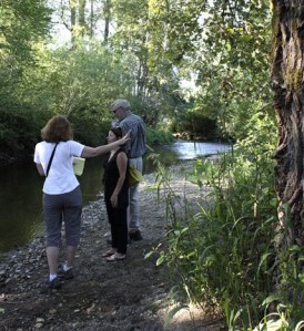 Issaquah Parks and Recreation Director Anne McGill points out Confluence Park plans to Park Board Member Stacy Goodman.