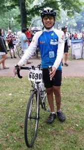 Garg stands proudly with his bike at the Seattle to Portland finish line.