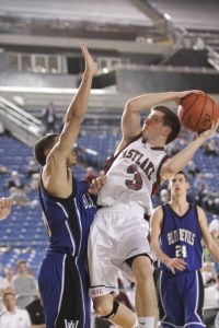 Eastlake's Dillon Pericin pulls up for a shot over Walla Walla's Gary Winston Friday at the Tacoma Dome.