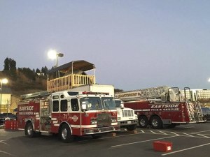 Battalion Chief Glenn Huffman and his son camped out on top of a truck over the weekend to collect donations for two area food banks.