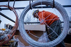 A Puget Sound Energy employee prepares his truck for possible response to power outages.
