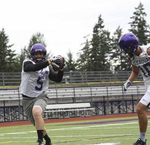 Seniors Jack Gellatly (with ball) and Tommy Nelson lead an experienced Issaquah secondary.