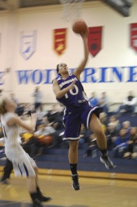 Maddey Pflaumer goes up for two of her team-best 14 points Saturday against Bellevue.