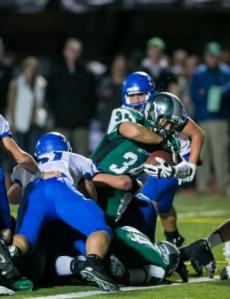 Skyline running back Chandler Wong goes in for one of hios two touchdowns in his team's 28-14 KingCo title game win.