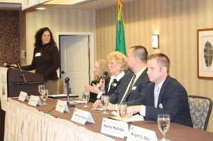 Enterprise Washington's Erin McCallum moderates the panel of candidates for Issaquah City Council during an Oct. 13 forum.